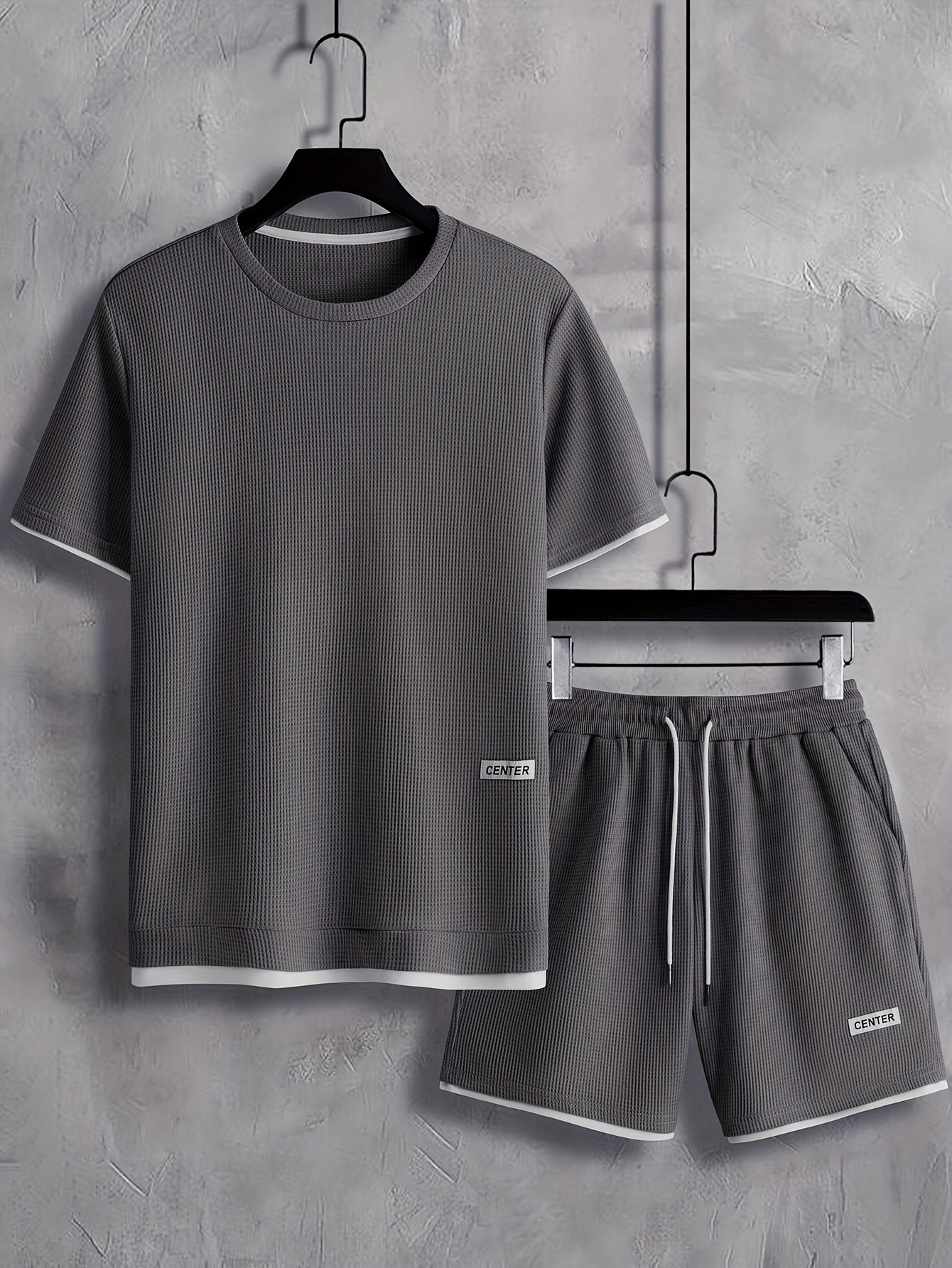 Set di maglietta e pantaloncini di tendenza per uomo