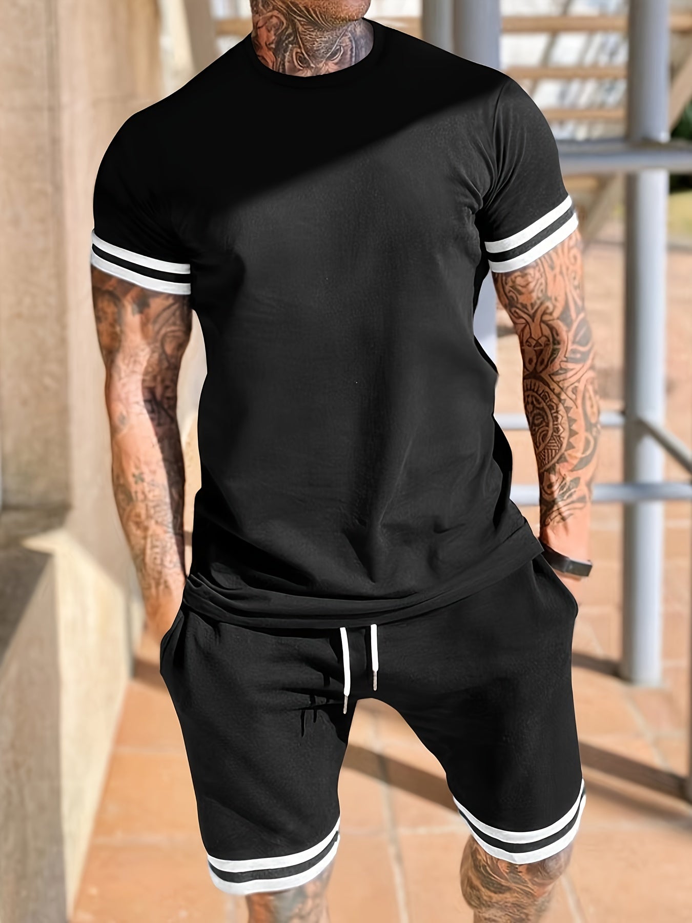 Set di t-shirt e pantaloncini sportivi per uomo