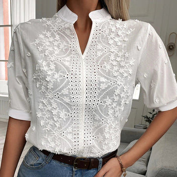 Blusa Bianca Chic ed Elegante con Ricamo Floreale e Scollo a V per Donna | Claire